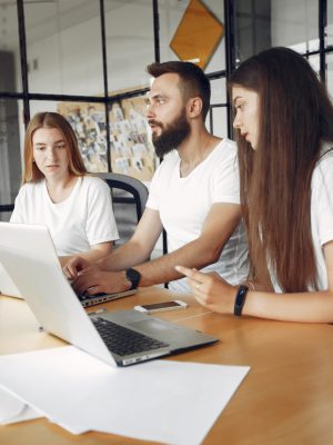 young-team-working-together-use-laptop